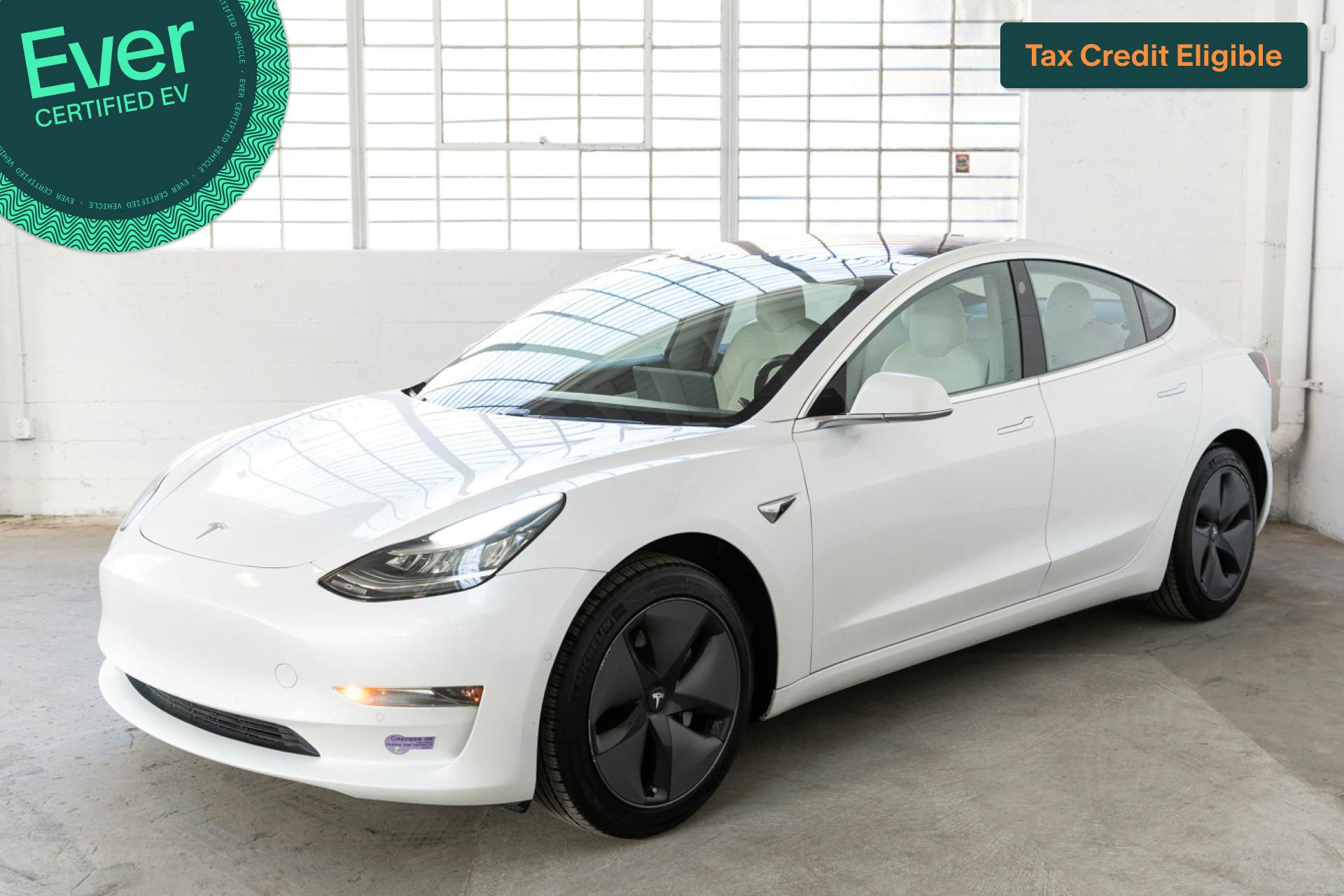 EverCars Co. featured vehicle's image for Tesla Model 3 - 2018 Mid Range on EverCars Co.