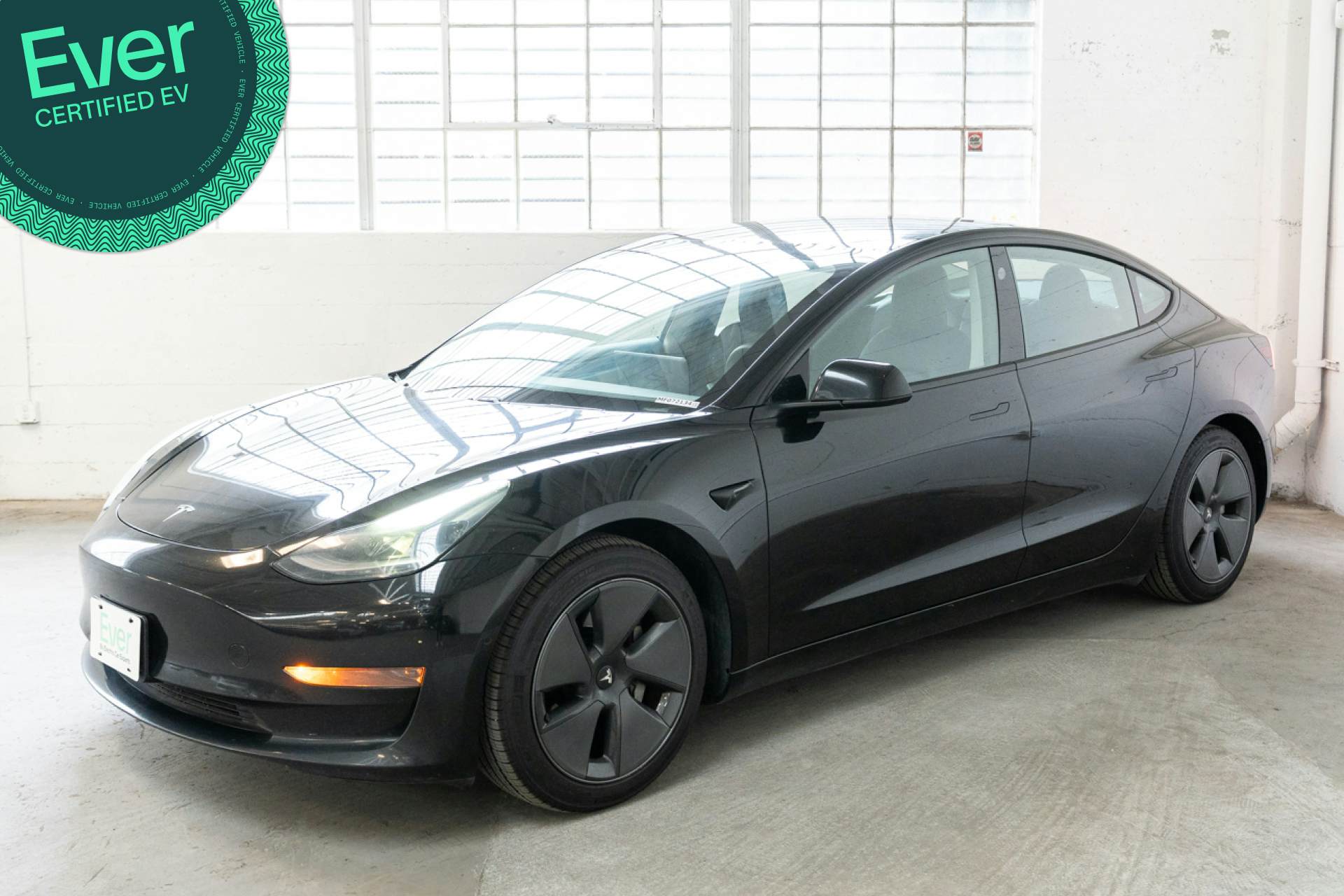 EverCars Co. featured vehicle's image for Tesla Model 3 - 2021 Standard Range Plus on EverCars Co.