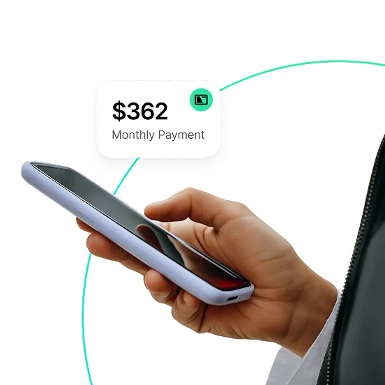 Hand holding phone with financing